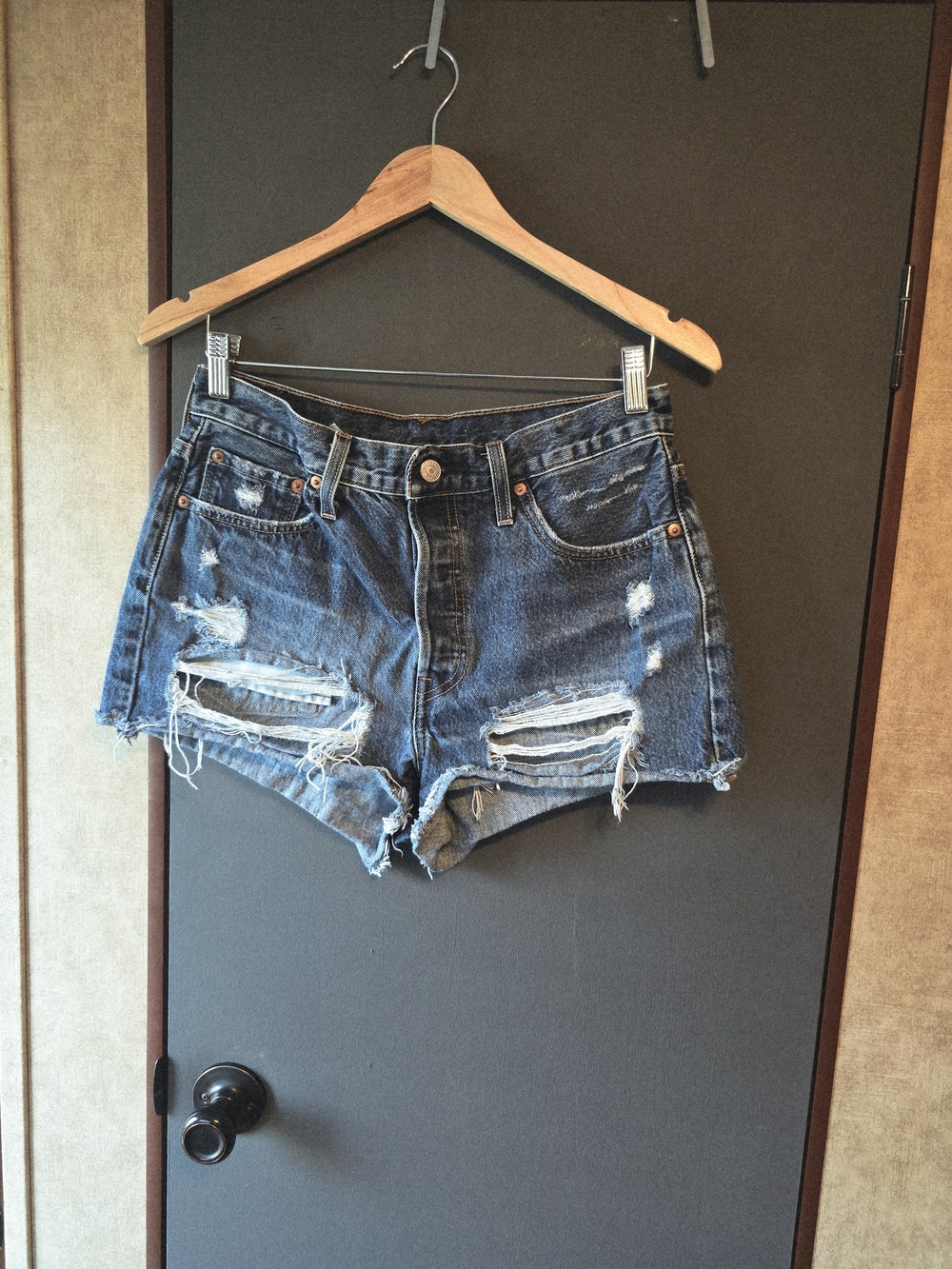 Levi's Distressed Dark Blue High-Rise Jean Cutoff Shorts